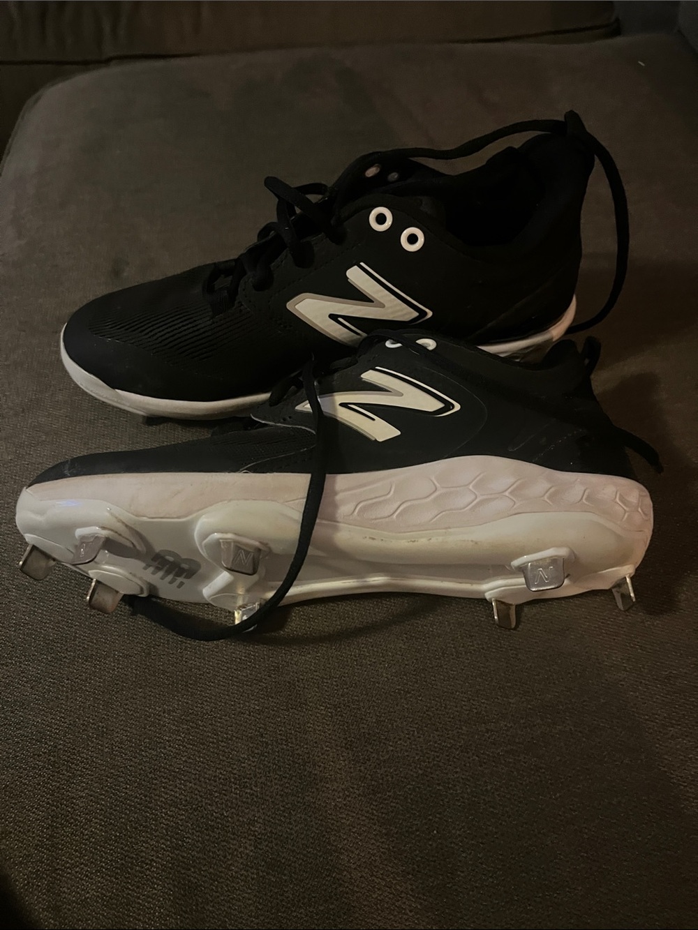 New Balance Kids Black and White Baseball Cleats with Metal Spikes